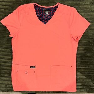 Women's coral Koi scrub top